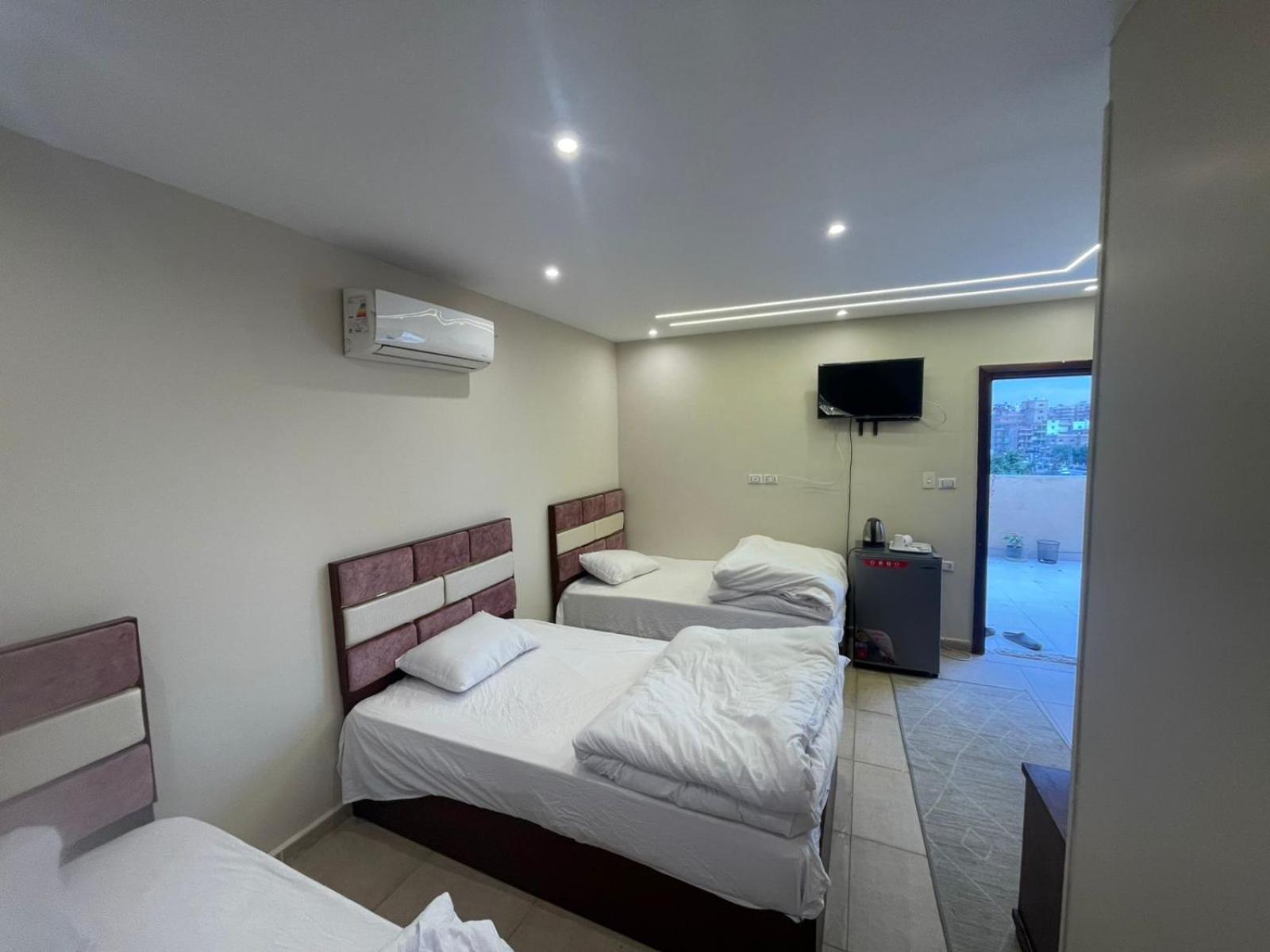 Sami Holiday Inn - Pyramids View Rooftop Al Kawm al Akhdar Εξωτερικό φωτογραφία